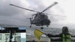 Посадка вертолёта на палубу в шторм
