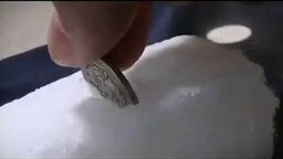 Смотреть Монета в сухом льду